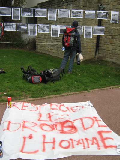 photos of police repression and banner