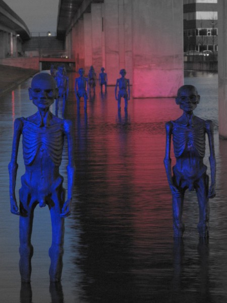 Refugee sculptures under metro at Bella Center