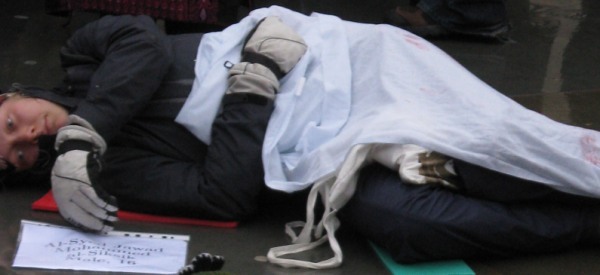 Sign reads: "Al-Syed Jawad Mohammed al-Siksik, Male, 16"