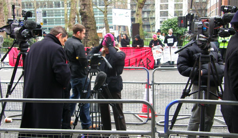 B6. Press Pen Frames Protesters