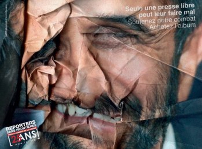 ad for the photography book marking Reporters Without Borders' 25th anniversary