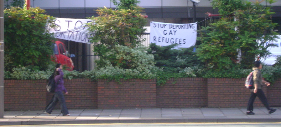 "Stop Deportation" & "Stop Deporting Gay Refugees" banners opposite UKBA office