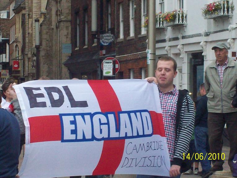 ...EDL! (with a St. George Flag they defaced)