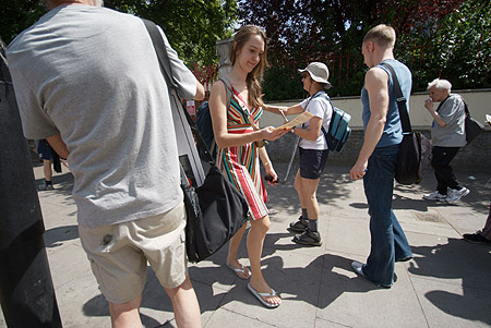 Lining Up to Take Leaflets.