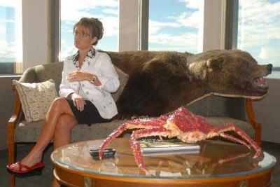 Sarah Palin sitting on bear skin
