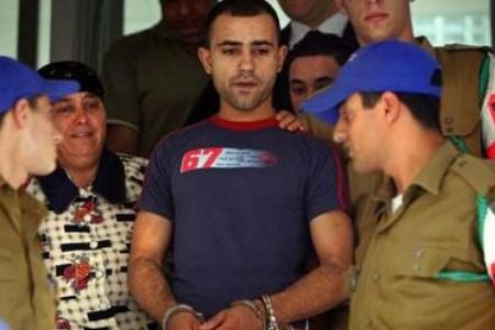 Israeli soldier Taysir Hayb being escorted to court in 2003
