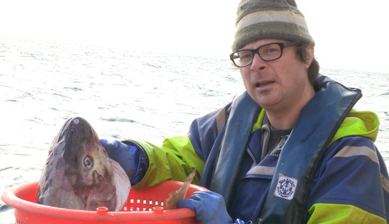 Hugh Fearnley-Whittingstall with North Sea cod destined to be discarded