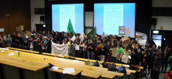 Students stand together during the first hour of occupation