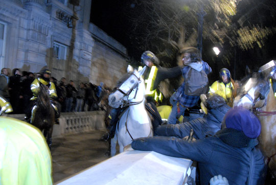 Police Horses Push Crowd Back