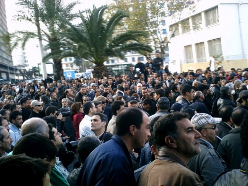 Demonstrators gather in Premier Mai Square