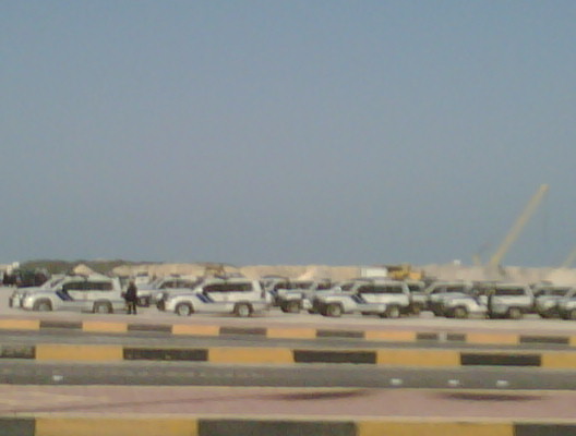 Police vehicles near the roundabout