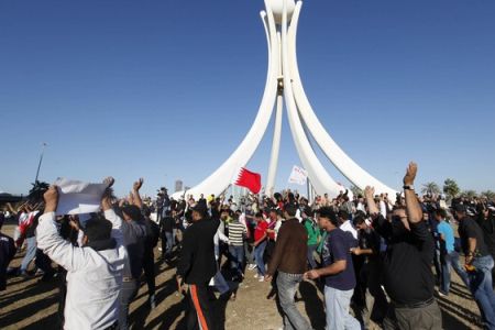 Bahraini protesters celebrate as they reoccupy Pearl Square, 19 February 2011