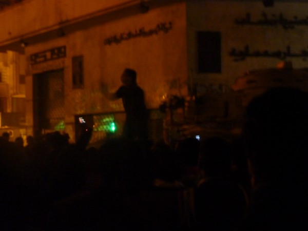 Child leads chants while occupying a tank - Tahrir Square 08/02/2011