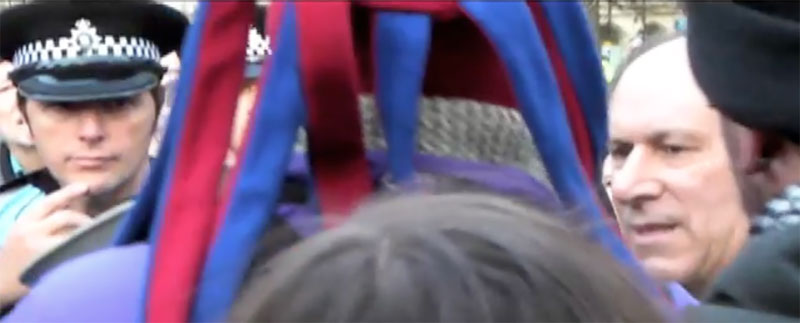 Man in Jester hat asks "Will you fight the cuts"?