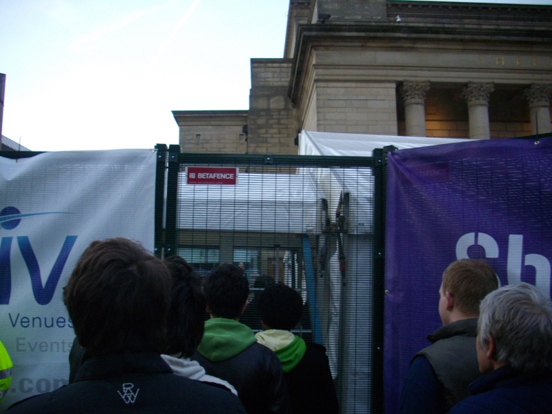Heckling delegates going into the tent