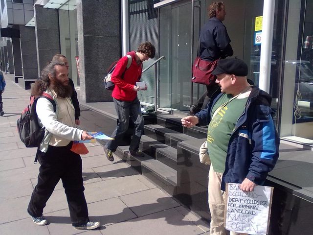 BoS customers and passers-by exchange leaflets