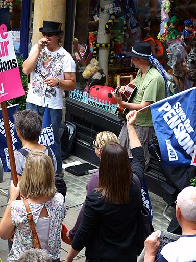Buskers sing back the chants!