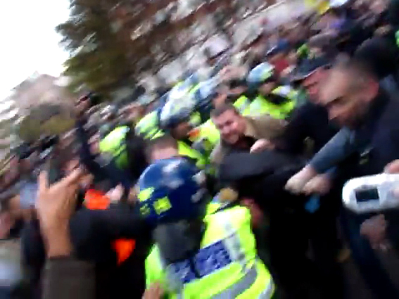 The charge of the not-so-light-brigade, brown jacket steams in...