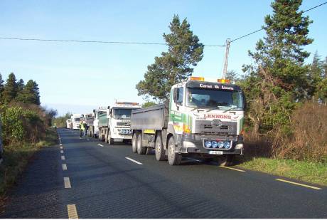 Trucks blocked up behind lock-on on haulage route