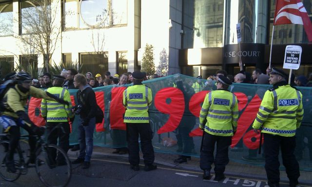The banner joins a picket