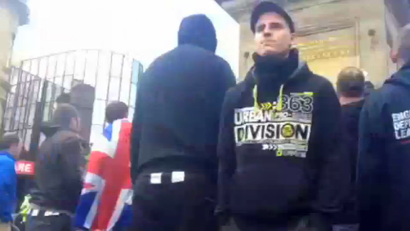 "Urban 863 Division" hoodie throws firework during NF / EDL attack in