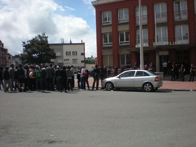 discussion outside the police station
