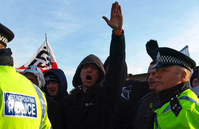 EDL flag + Nazi salute