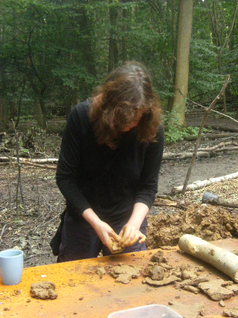 Making use of the clay for pottery