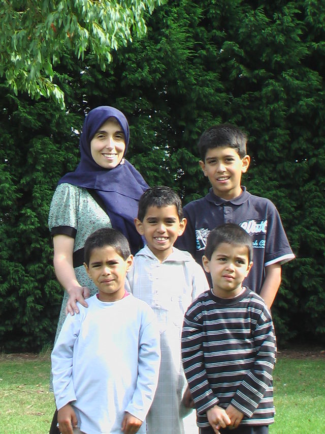 The children with their mother and youngest brother at their home in Cambridge.