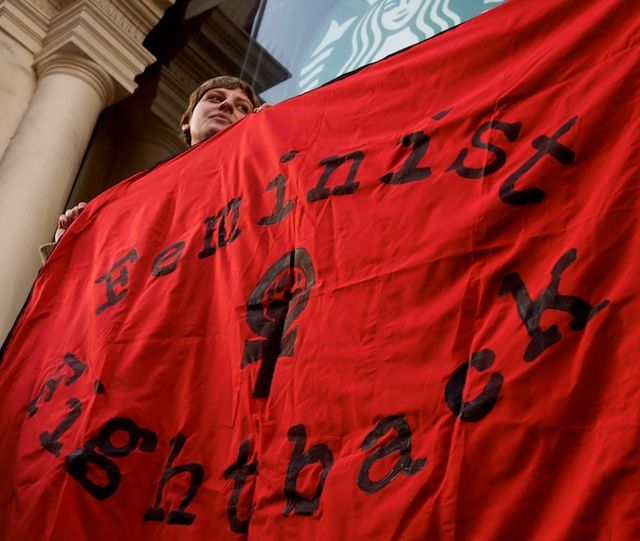 feminist banner for starbucks