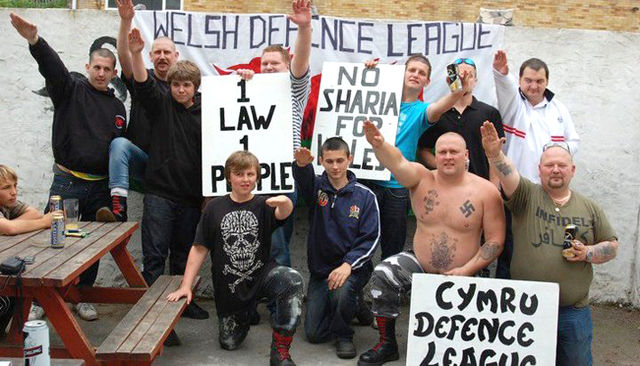 The same WDL flag & banners + Nazi salutes