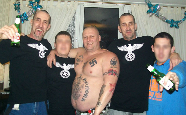 Powell brothers (Swastika shirts) with Wayne Baldwin (Swastika tattoo)