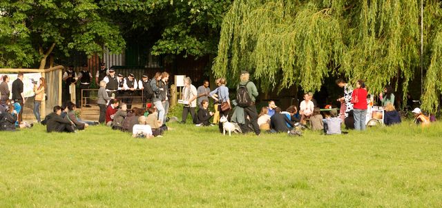 speakers and cops in mudchute field