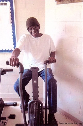 Herman Wallace, out of solitary, no shackles, on bike.