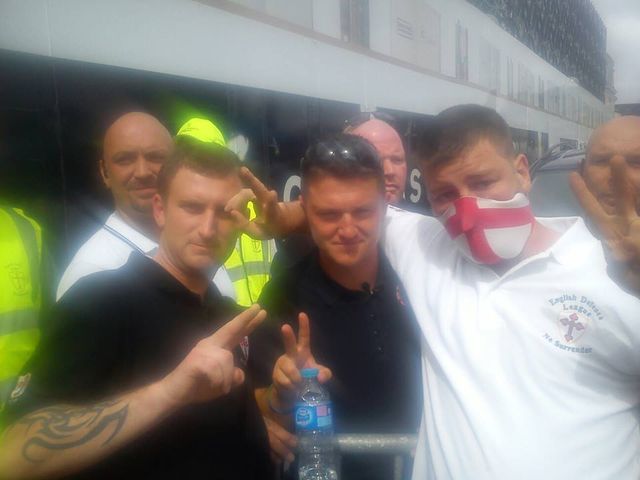 Shaun Davison from Sunderland poses next to EDL 'leader' Tommy Robinson