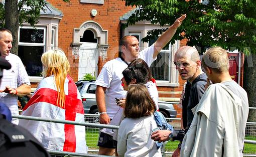 Same EDL marcher - makes Nazi salute