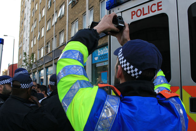 Police filming a kettle