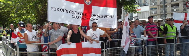 Same EVF flag - note guy in fuschia T-shirt with horizontal blue & white stripes