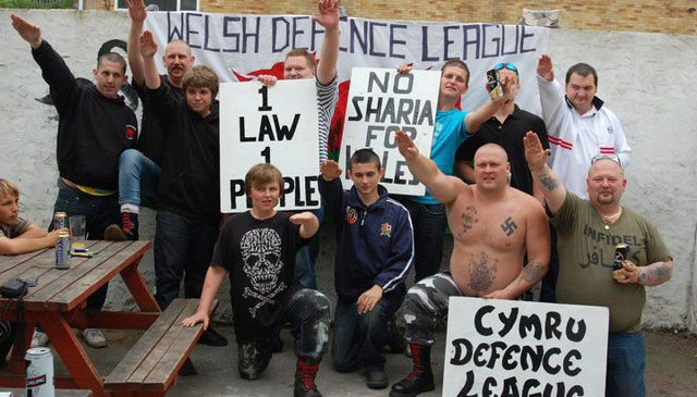 WDL flag and Nazi salutes (Luke Pippen with blue shades, face obscured)