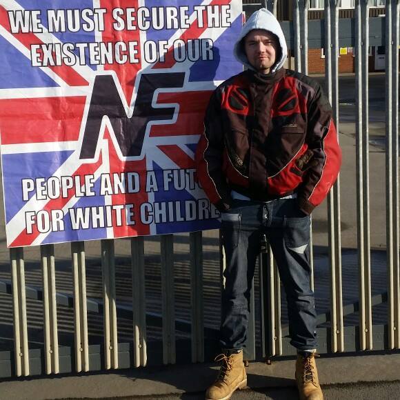 Jed Stoker Charlton next to NF banner