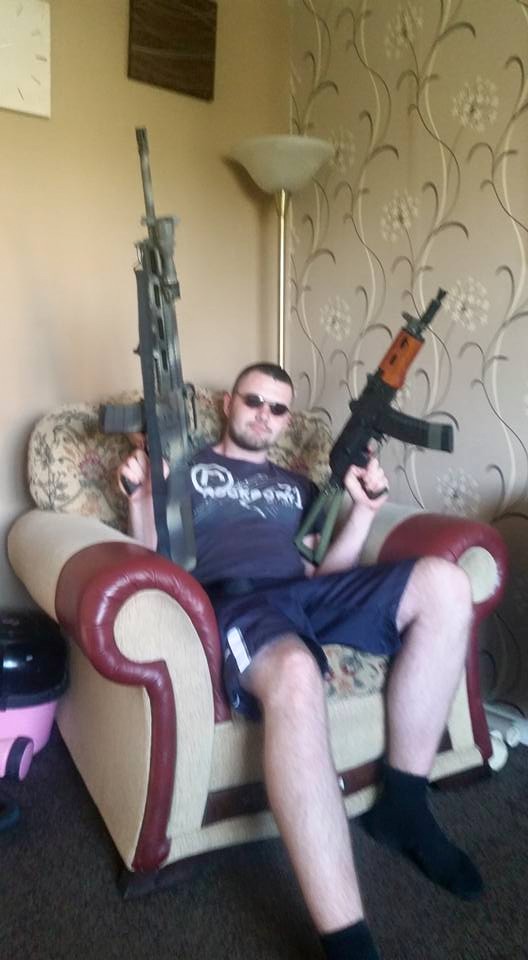 Jed Stoker Charlton with weapons