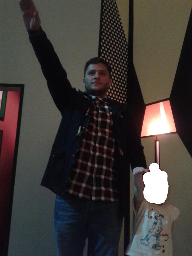 Andy Clarke NA member from Liverpool manipulating his child to give nazi salute